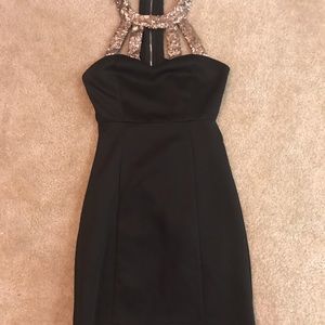 Black body con dress with gold sequin neck